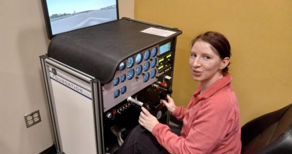 Photos by Robert Whale, Auburn Reporter
Colie Brooks at work learning how to integrate wing flaps into her landing procedure on a simulator at the GRC Aviation Center.