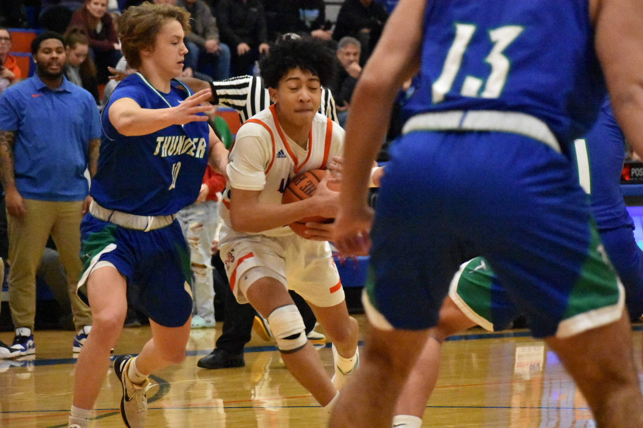 Jamaal Elliott drives to basket during the state playoff game against Mountain View. Photo Credit: Ben Ray/The Reporter