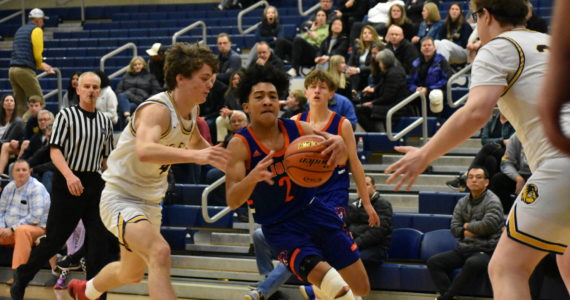 Lion senior Jamaal Elliot drives to the basket. Ben Ray / The Reporter