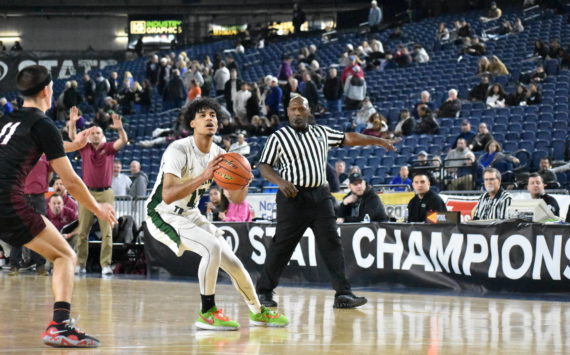 Auburn senior Tyrell Nichols takes a three-pointer. Ben Ray/The Reporter