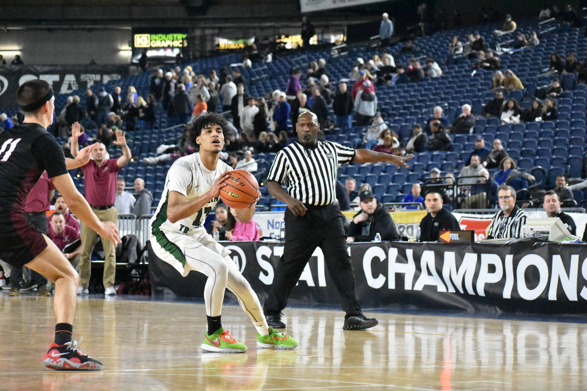 Auburn senior Tyrell Nichols takes a three-pointer. Ben Ray/The Reporter