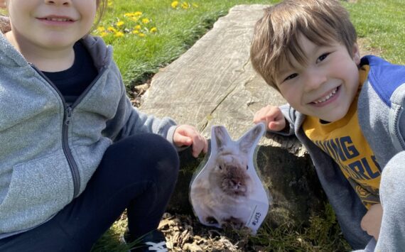 A couple of past participants in the Peter Cotton Trail event smile at their discovery of the elusive bunny. Photo courtesy of Auburn Parks, Arts and Recreation