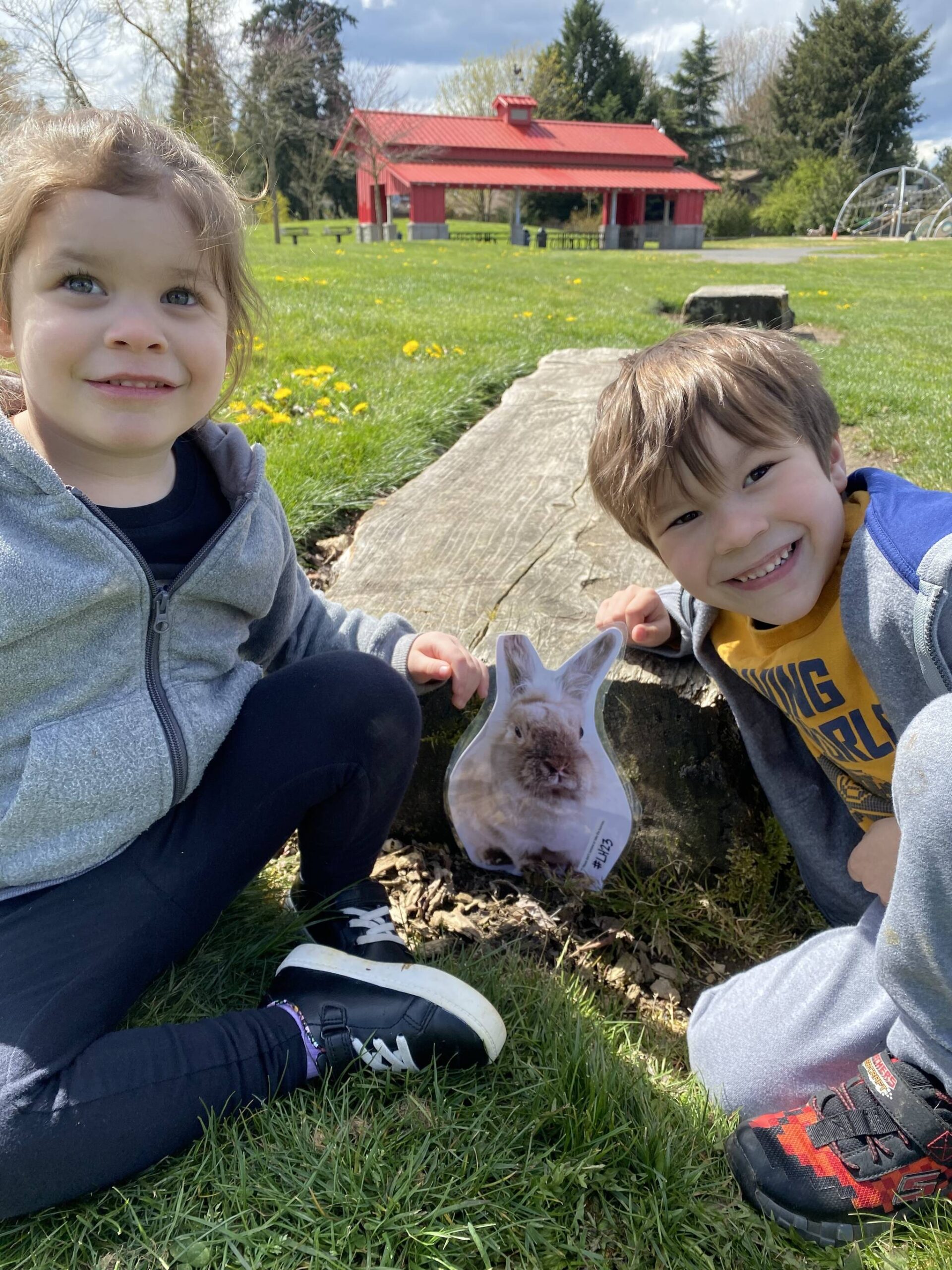 A couple of past participants in the Peter Cotton Trail event smile at their discovery of the elusive bunny. Photo courtesy of Auburn Parks, Arts and Recreation