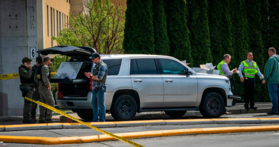 Law enforcement officials investigate the scene of a fatal shooting near a freeway ramp in Federal Way on May 4, 2022. (File photo courtesy of South Sound News)