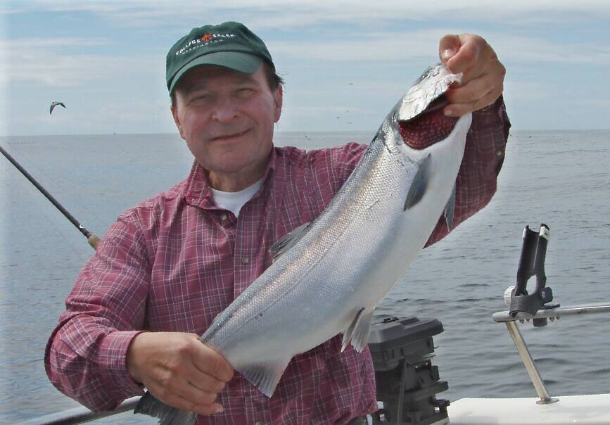 Former Green River College President Rich Rutkowski was a man of singular vision, friends say, as well as a renaissance man with broad knowledge of many fields, including fishing. (Photo courtesy of Tawnya McLavey/Green River College)