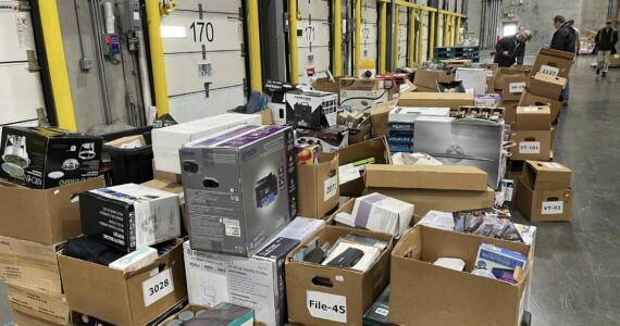 Stolen merchandise is piled up at the Safeway Distribution Center, the result of the Auburn Police Department’s multi-jurisdictional investigation into a pawn shop scheme. (Photo courtesy of Auburn Police Department)