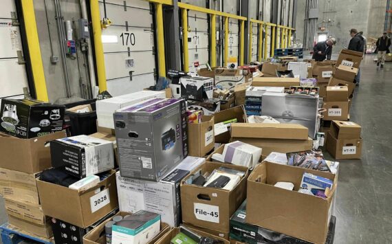 Stolen merchandise is piled up at the Safeway Distribution Center, the result of the Auburn Police Department’s multi-jurisdictional investigation into a pawn shop scheme. (Photo courtesy of Auburn Police Department)