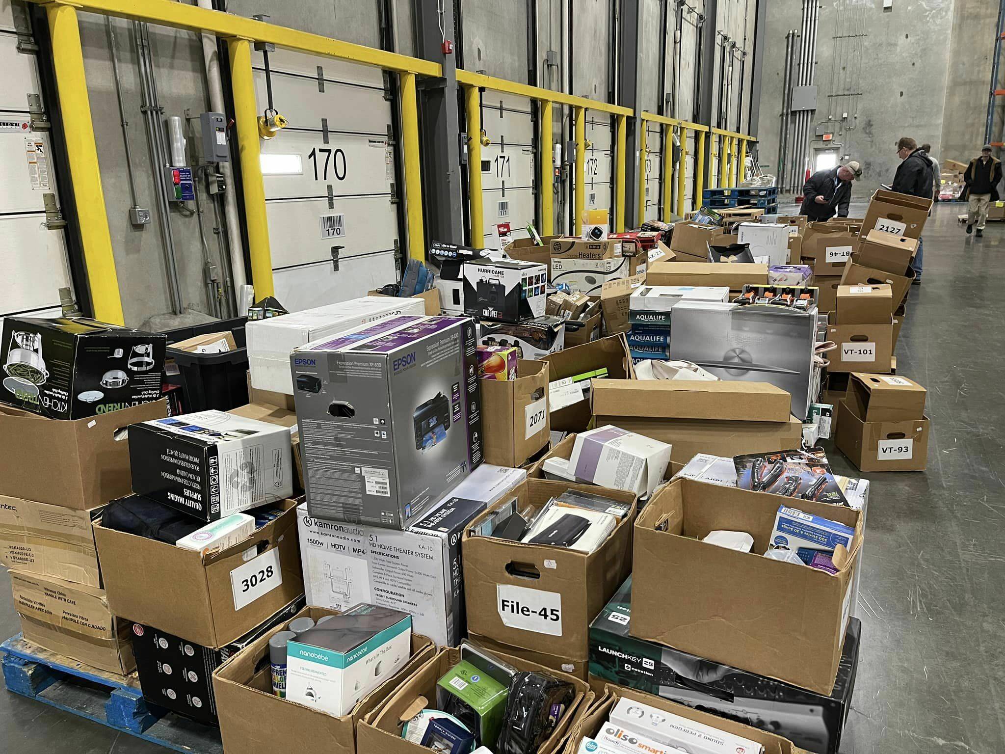 Stolen merchandise is piled up at the Safeway Distribution Center, the result of the Auburn Police Department’s multi-jurisdictional investigation into a pawn shop scheme. (Photo courtesy of Auburn Police Department)