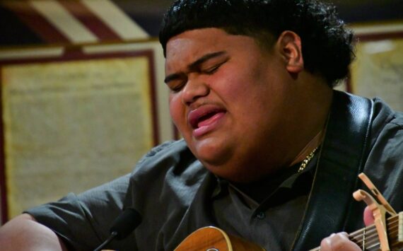 Iam Tongi sings “Courage” during the March 21 Federal Way City Council Meeting. Photo by Bruce Honda.