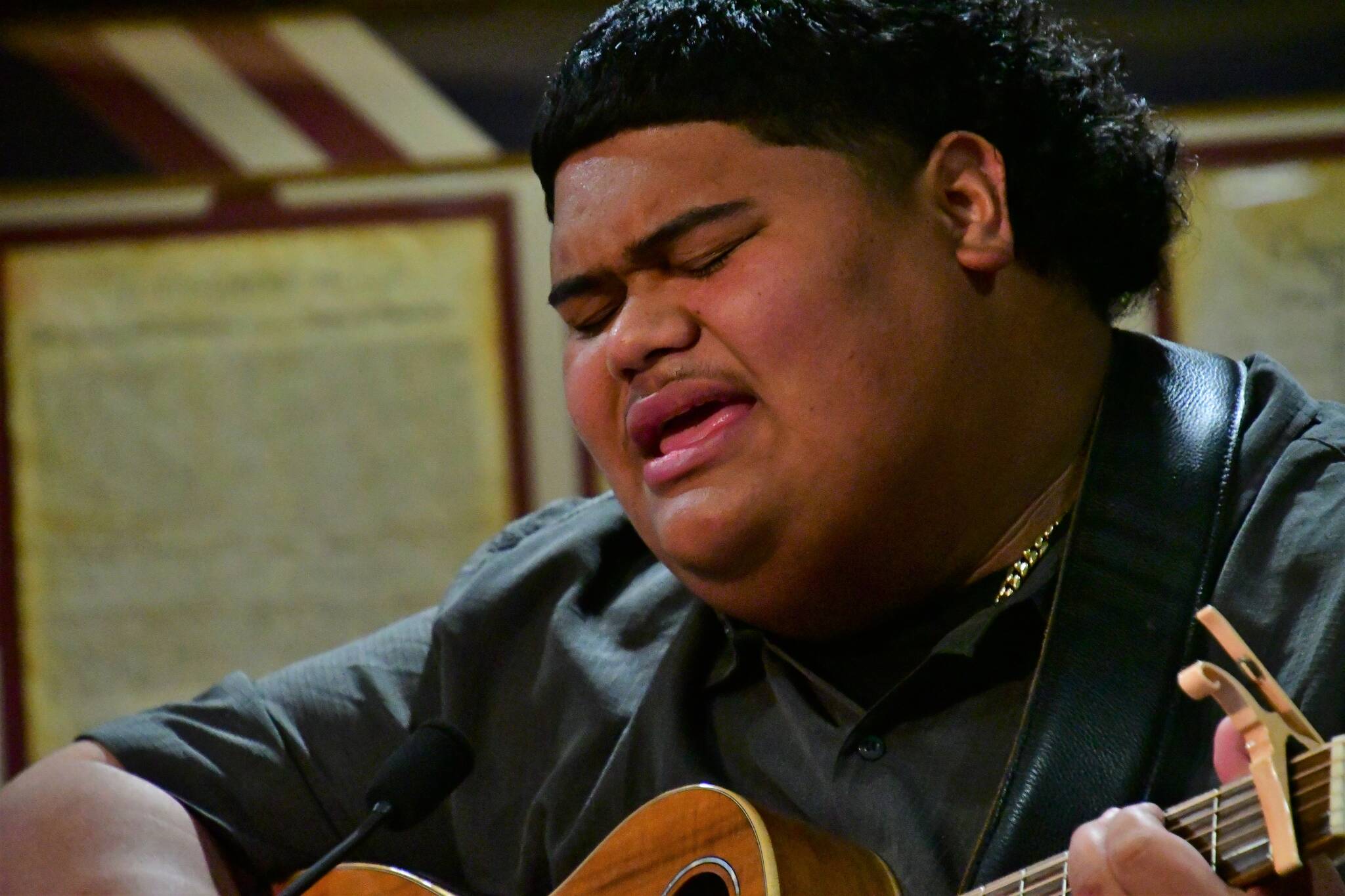 Iam Tongi sings “Courage” during the March 21 Federal Way City Council Meeting. Photo by Bruce Honda.