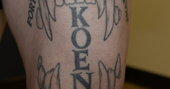 Photo of tattoos on Jeffrey Nelson’s leg. File photo