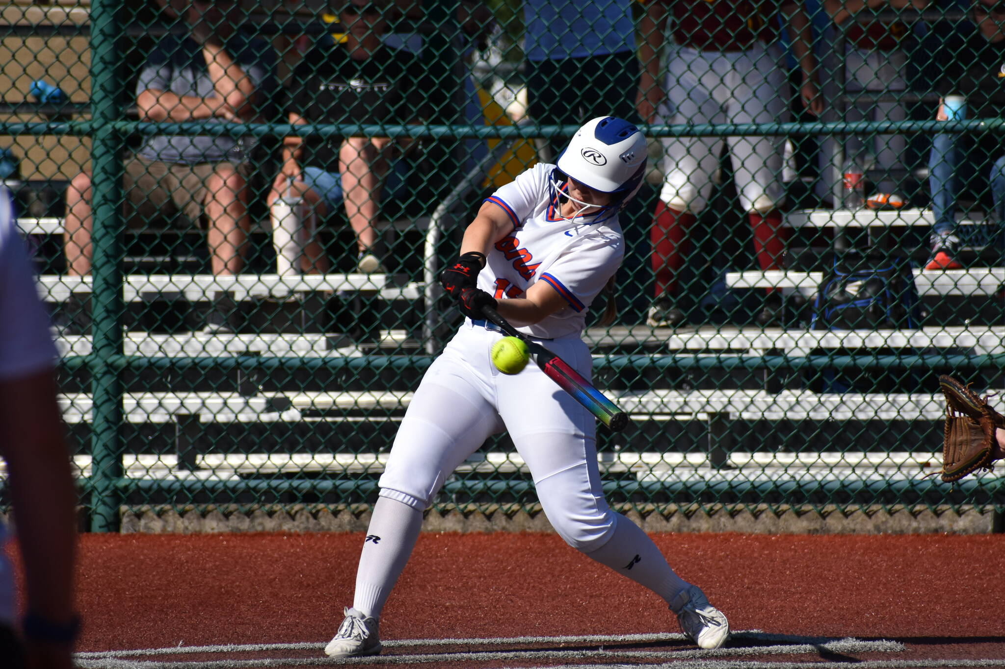 Auburn Mountainview’s Lila McBee makes contact out front with a pitch against Evergreen. Ben Ray / The Reporter