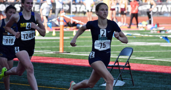 Julia Couch made her move and took home her second consecutive 800 meter state title. Ben Ray / The Reporter