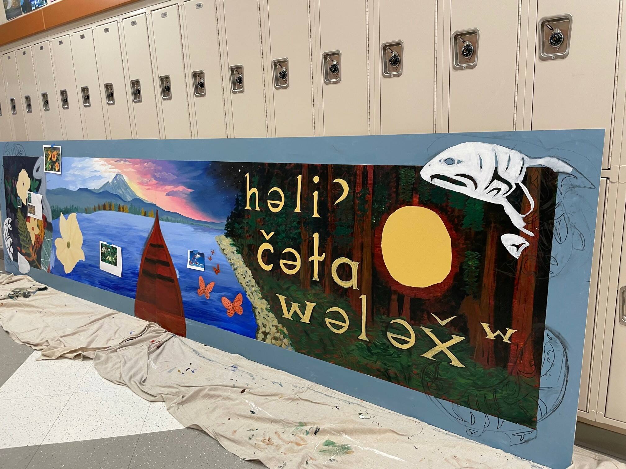 Photos courtesy of Auburn School District
Elisabeth Ronley, an art teacher at Auburn High School, secured a grant to paint a mural titled “We Are Alive and Strong” at the school. The mural includes many elements of Native American culture and history.