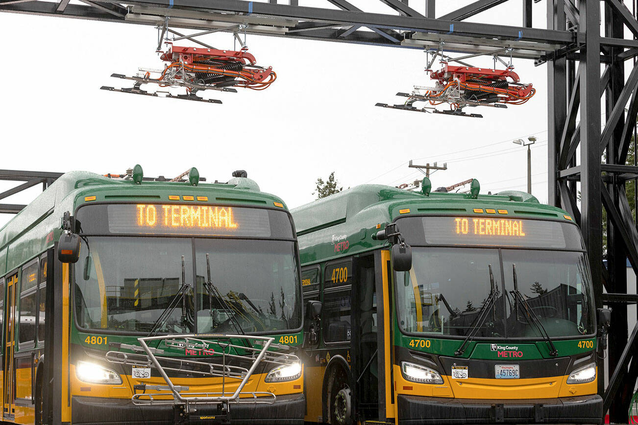 King County Metro battery-electric coaches at Metro’s South Base in Tukwila. COURTESY FILE PHOTO, King County Metro