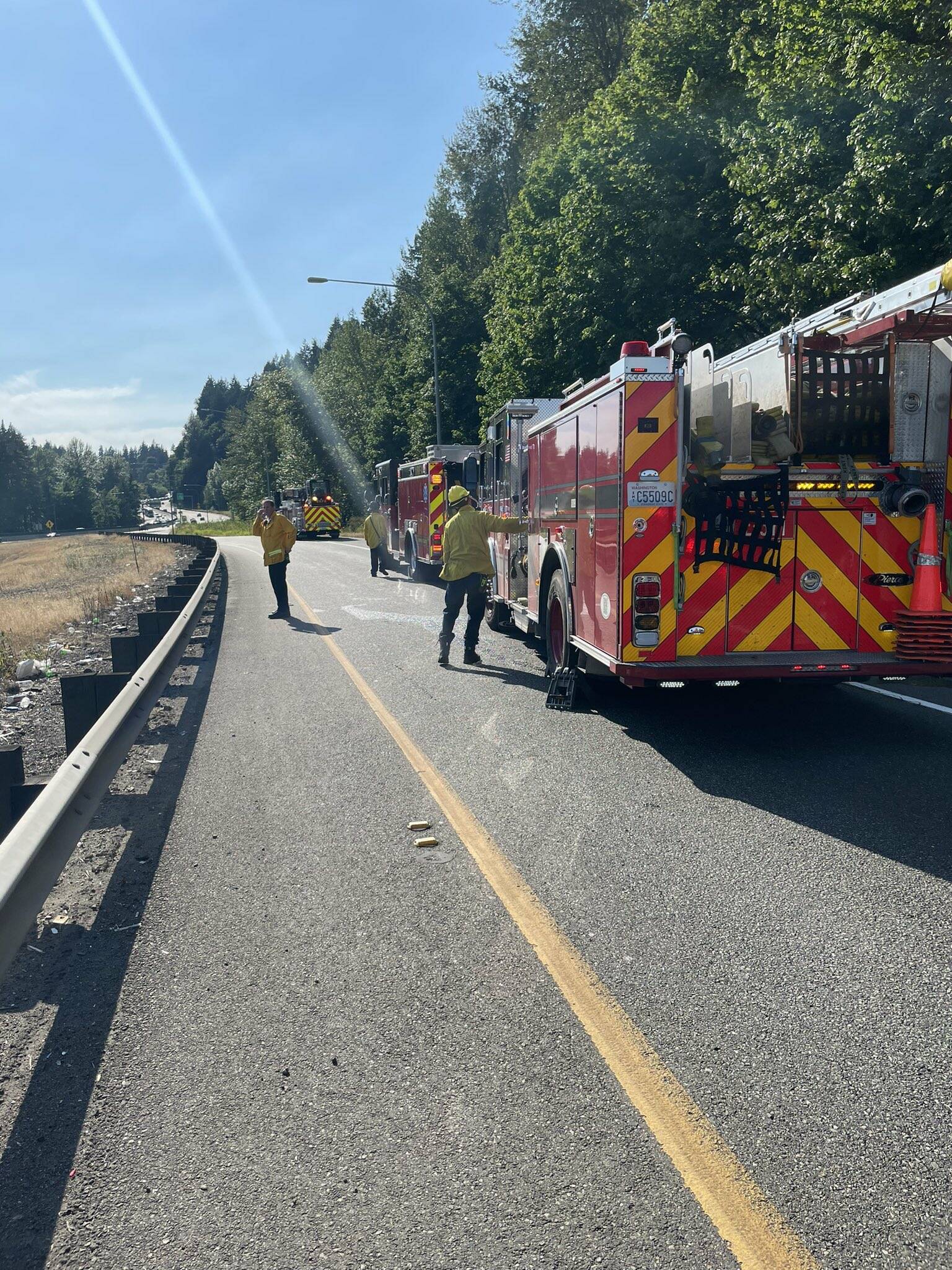 Officials temporarily shut down SR 18, west of SR 167, to traffic as a result of the brush fire. (Courtesy of the Renton Regional Fire Authority.)