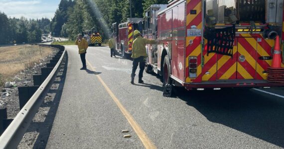 Officials temporarily shut down SR 18, west of SR 167, to traffic as a result of the brush fire. (Courtesy of the Renton Regional Fire Authority.)
