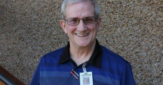 Rick Kain, the Auburn School District’s “print guy,” retires Aug. 31, after 42 years on the job. (Courtesy photo, ASD)