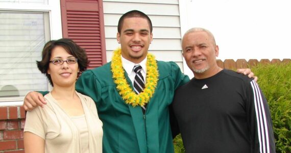 Enosa Strickland Jr. with his parents Kathleen Keliikoa-Strickland and Enosa Strickland Sr. (Courtesy photo)