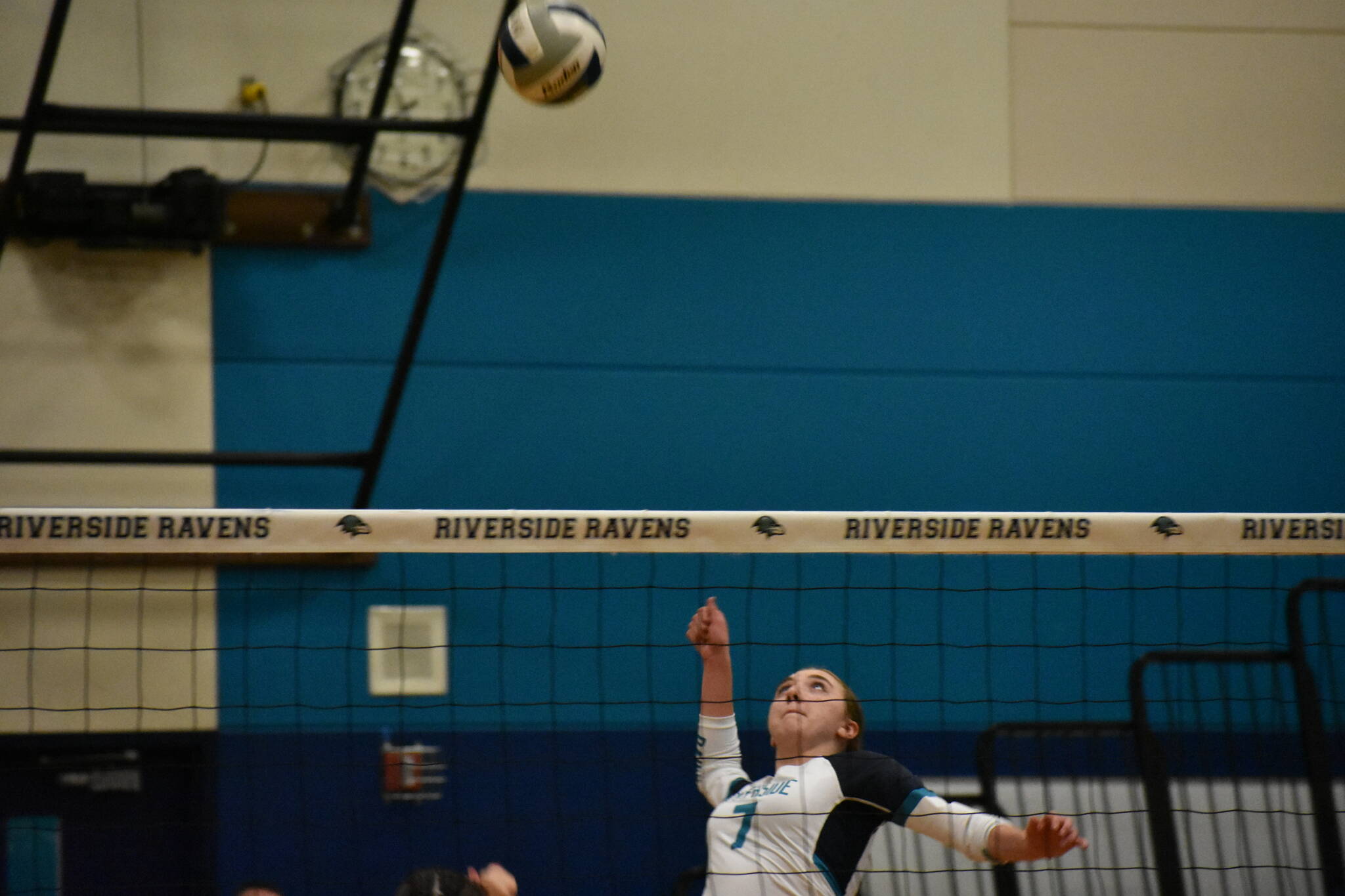 Junior Bryanna Dodson goes for a spike. Ben Ray / The Reporter
