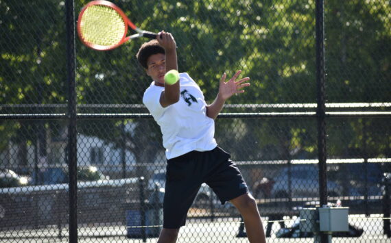 Solomon Smith hits a forehand in the lone win against Thomas Jefferson. Ben Ray / The Reporter