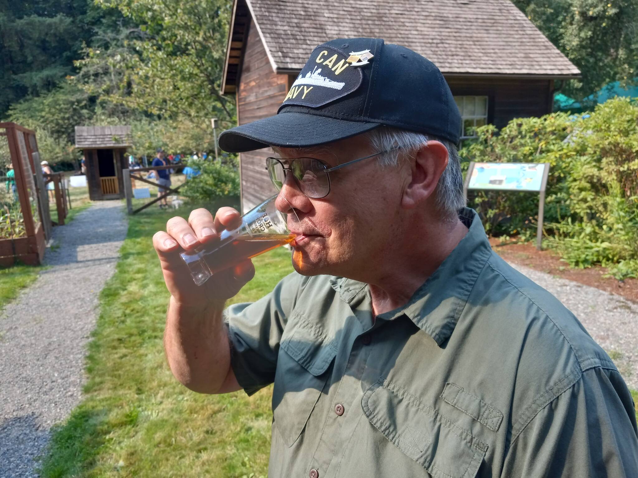Photos by Robert Whale, Auburn Reporter
Kent resident and U.S. Navy veteran Karey Wise relishes a long pull on his Octoberfest Märchen at Auburn’s Hops and Crops beer and music festival out at Mary Olson Farm on Sept. 16.