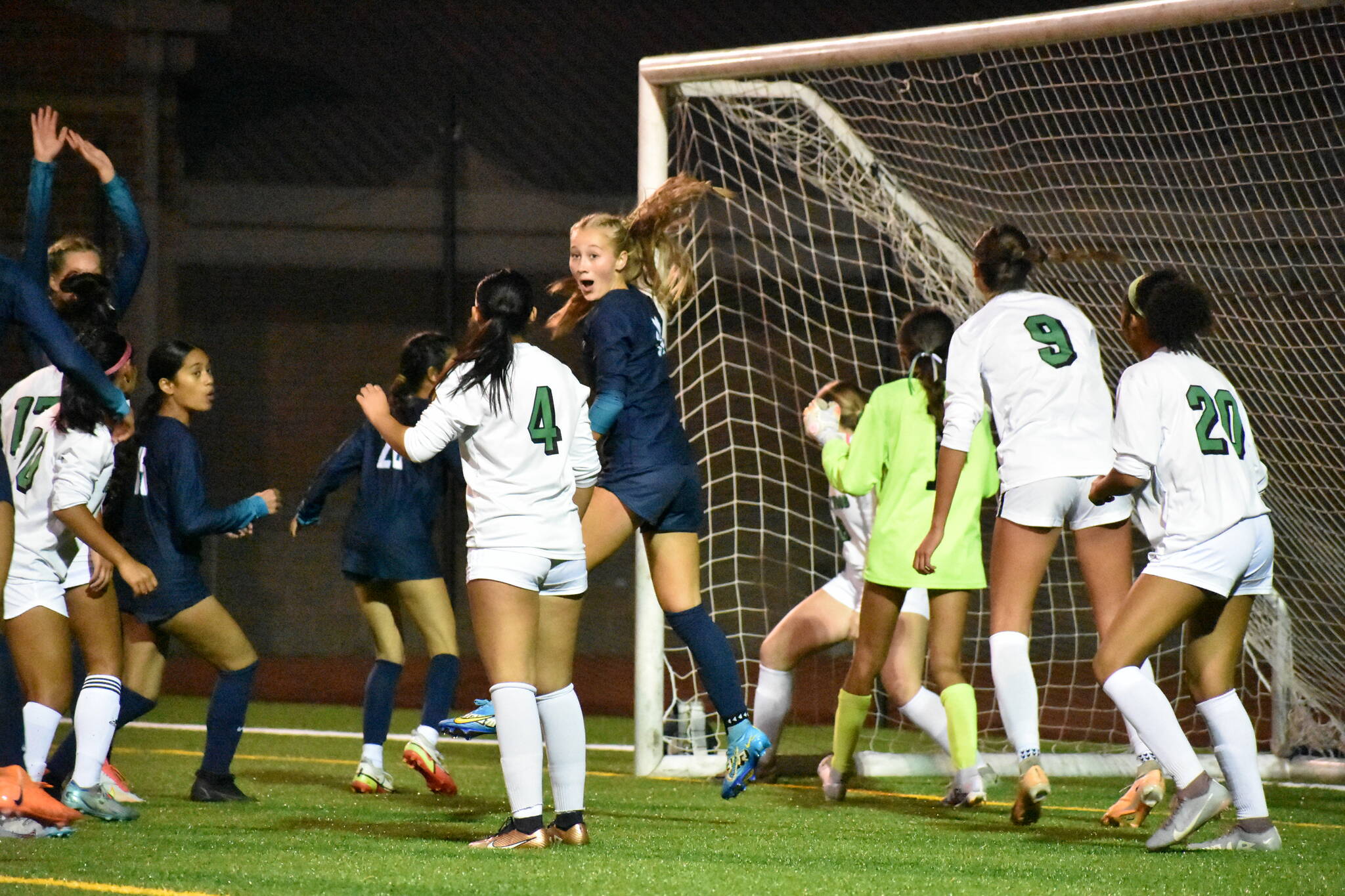 Harper Curnutt with a very animated reaction as the Ravens get their third goal of the game. Ben Ray / The Reporter