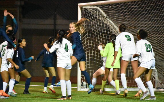 Harper Curnutt with a very animated reaction as the Ravens get their third goal of the game. Ben Ray / The Reporter