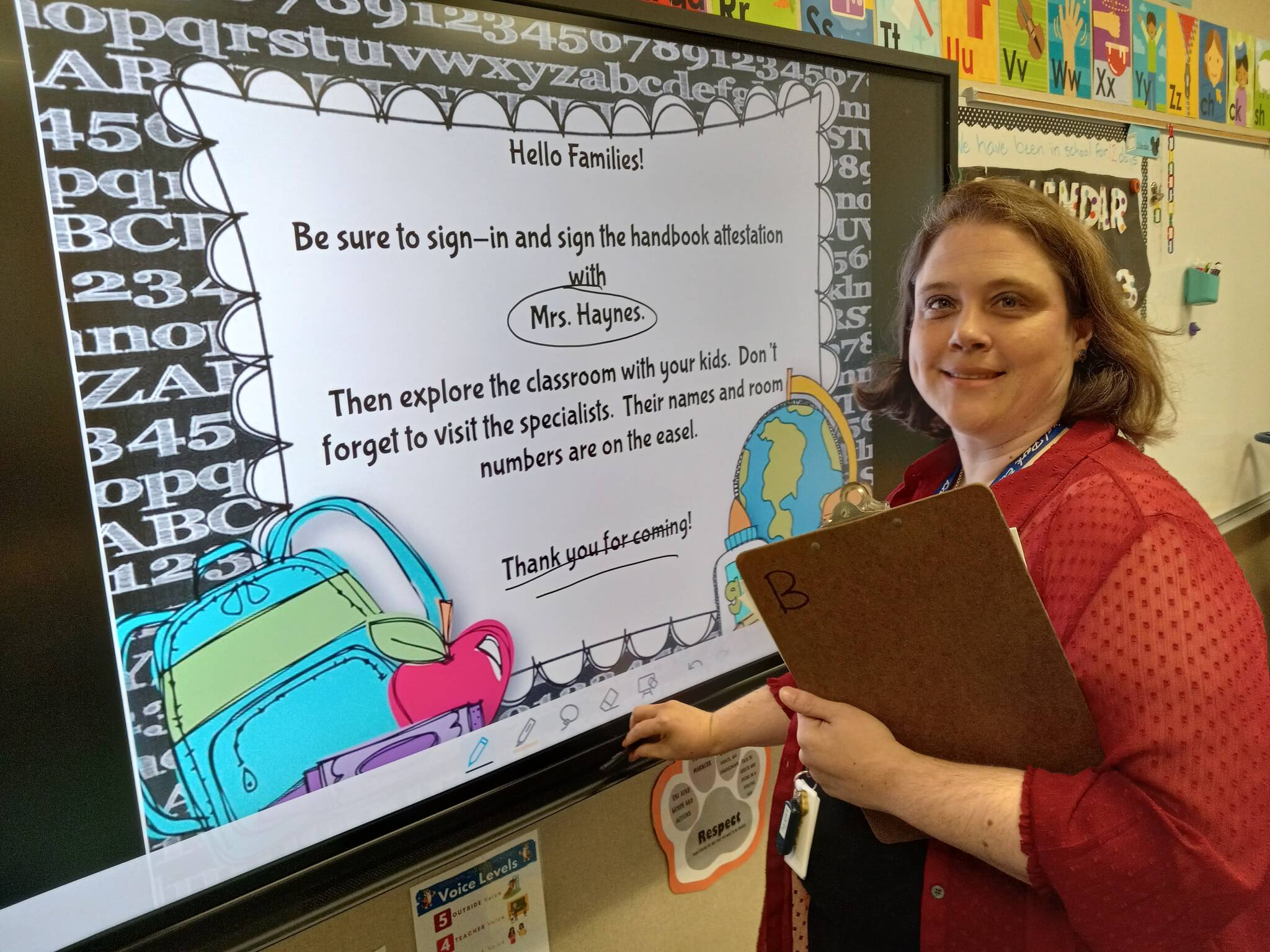 ROBERT WHALE, Auburn Reporter
Fourth-grade teacher Jennie Haynes explains her electronic display, something of a replacement for the chalkboards of yesteryear.