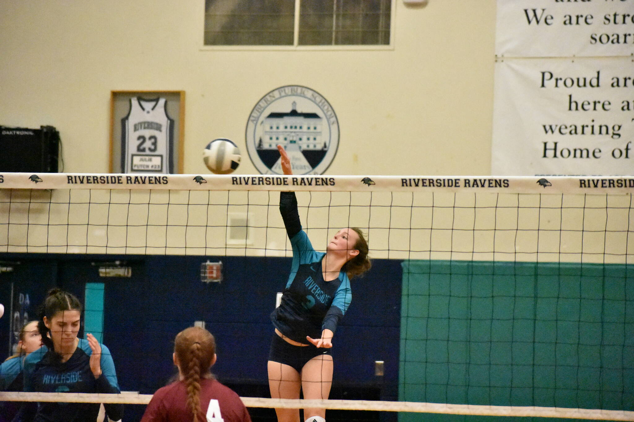 Senior Sydney Priebe goes in for the kill in the first set. Ben Ray / The Reporter