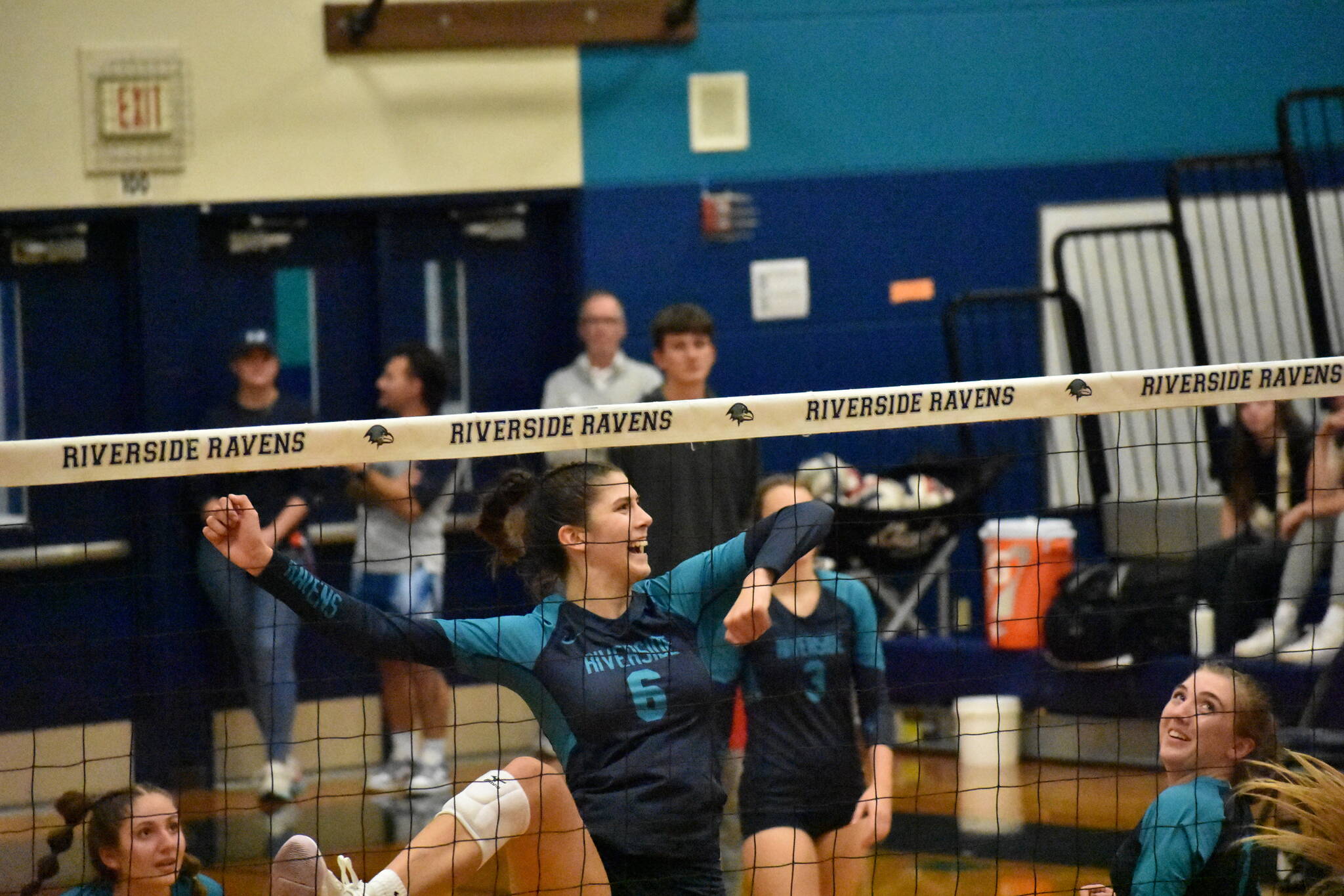 Raven senior Sophie Danielson cracks a smile in the third set in the win over Kentlake. Ben Ray / The Reporter