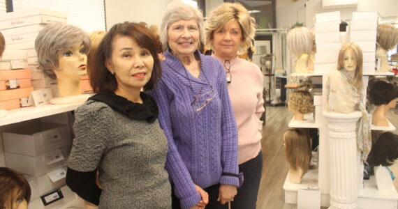 Photos by Bailey Jo Josie/Sound Publishing
June Paik (left) and her employees at Master Hair Care can work with clients for hours to find the perfect wig or hair piece.