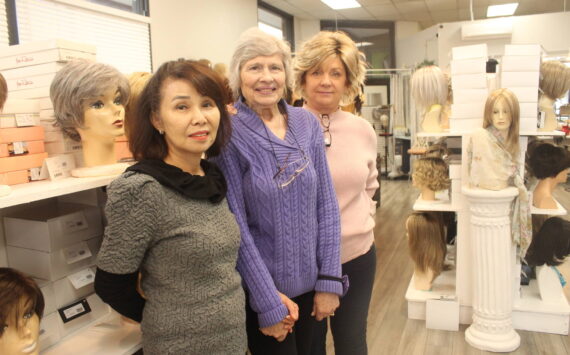 Photos by Bailey Jo Josie/Sound Publishing
June Paik (left) and her employees at Master Hair Care can work with clients for hours to find the perfect wig or hair piece.