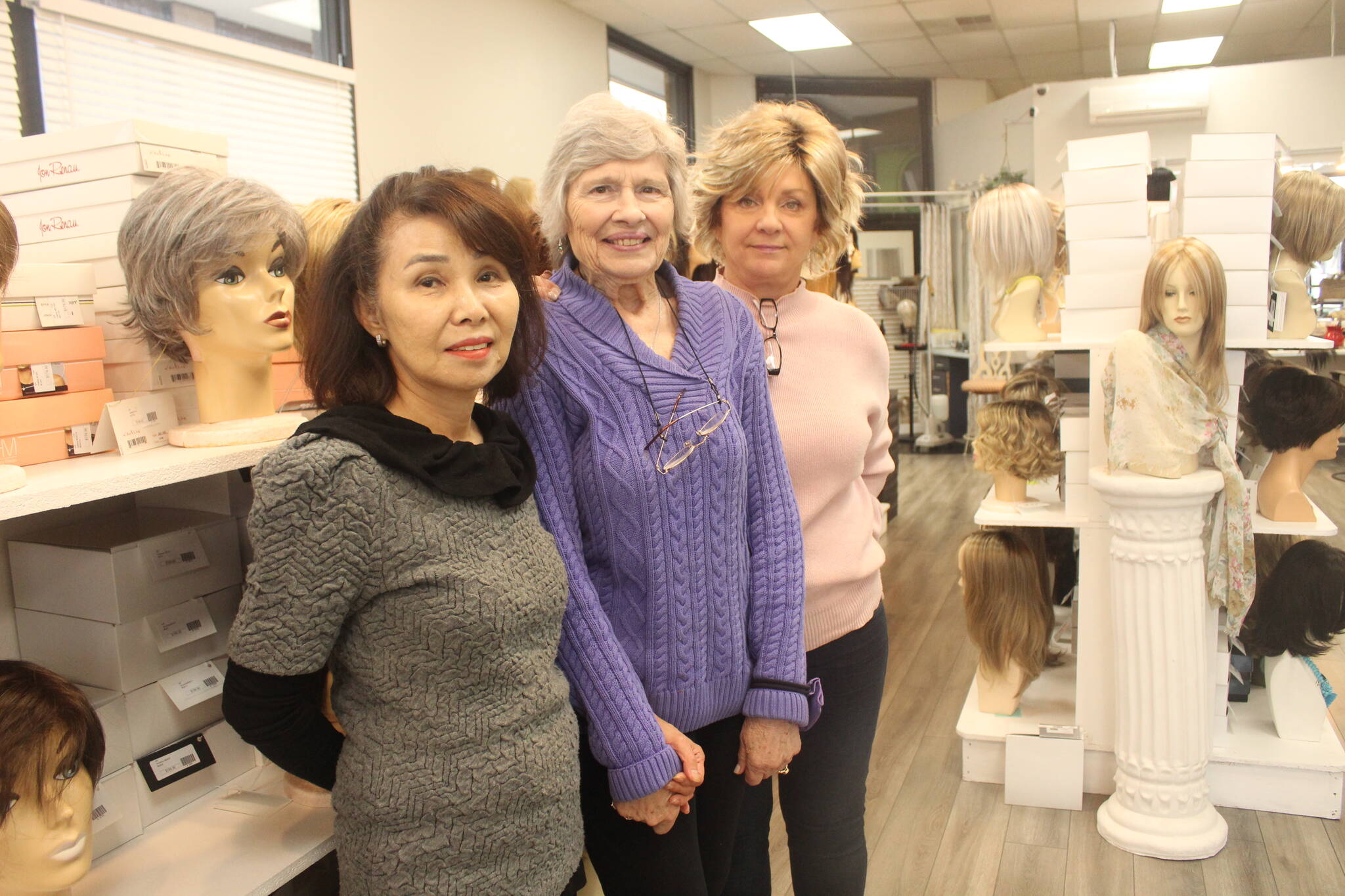Photo by Bailey Jo Josie/Sound Publishing
June Paik (left) and her employees at Master Hair Care can work with clients for hours to find the perfect wig or hair piece.