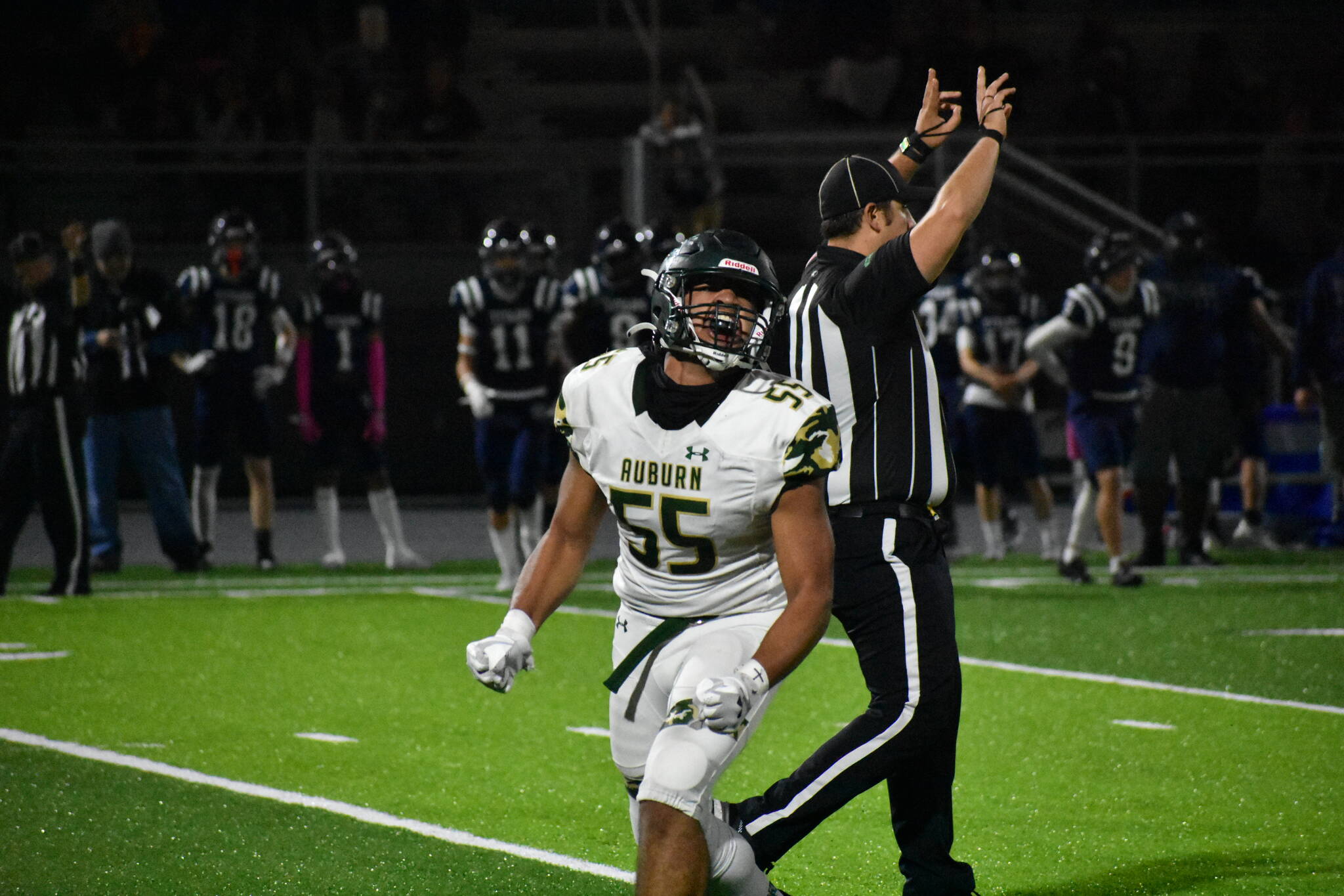Fale Titialii celebrates after a sack for the Trojans. Ben Ray/ The Reporter