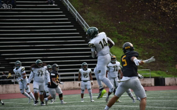Luvens Valcin makes a catch against Lincoln. (Ben Ray / The Reporter)