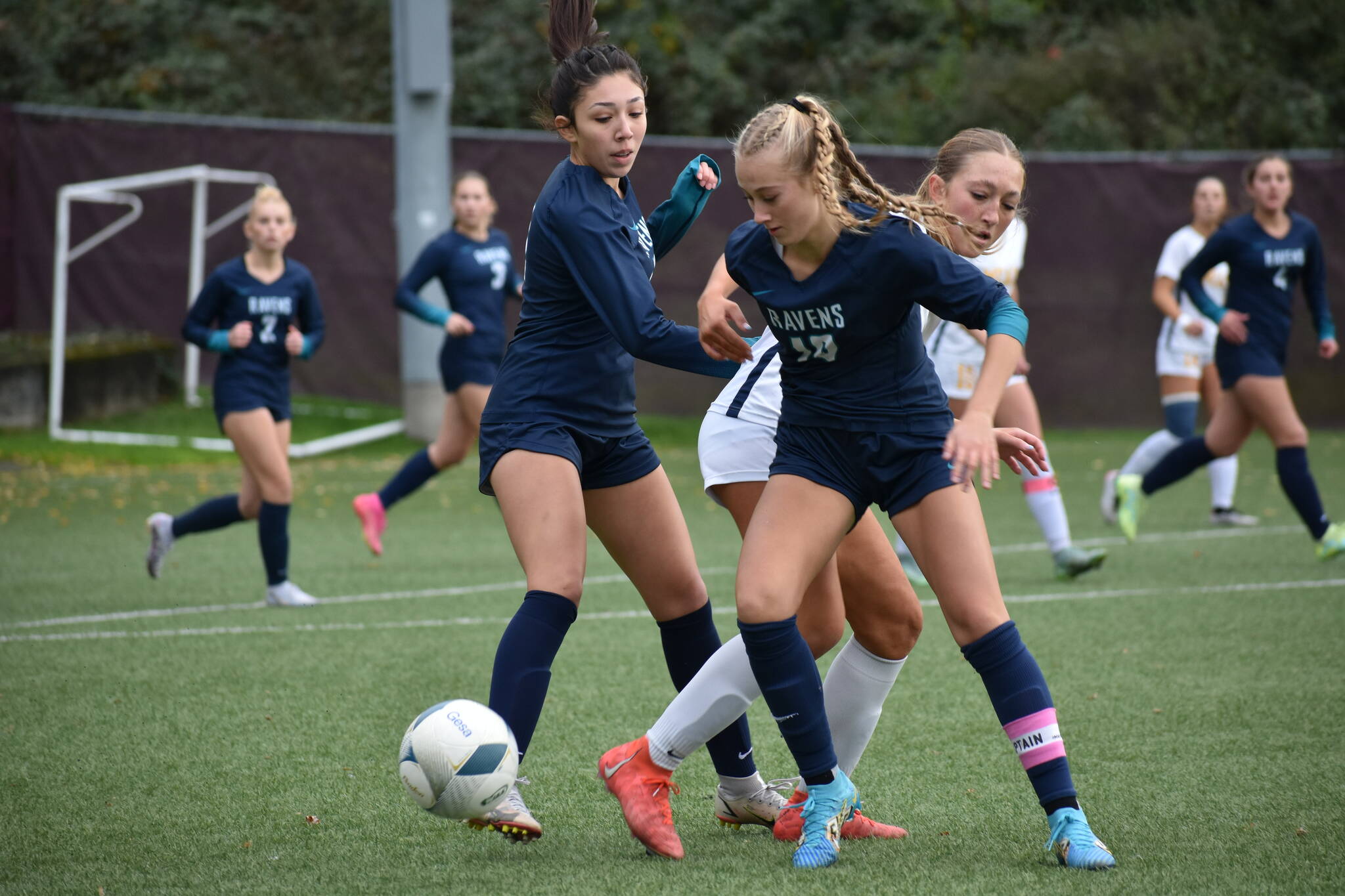 Soph. Harper Curnutt takes possession from a Mead player . Ben Ray / The Reporter