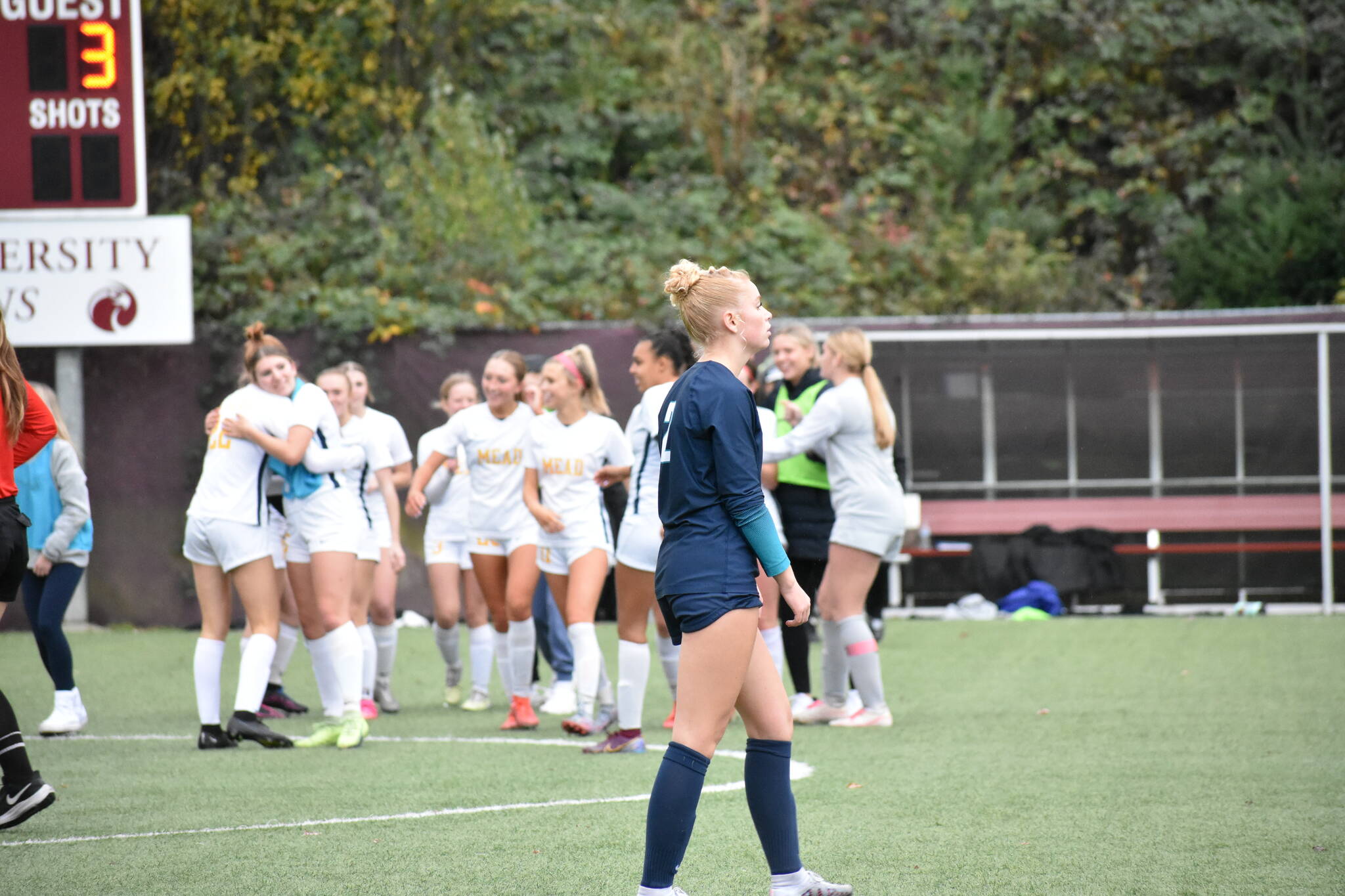 Senior Sienna Tew walks towards her keeper Rory Murry as Mead celebrates. Ben Ray / The Reporter