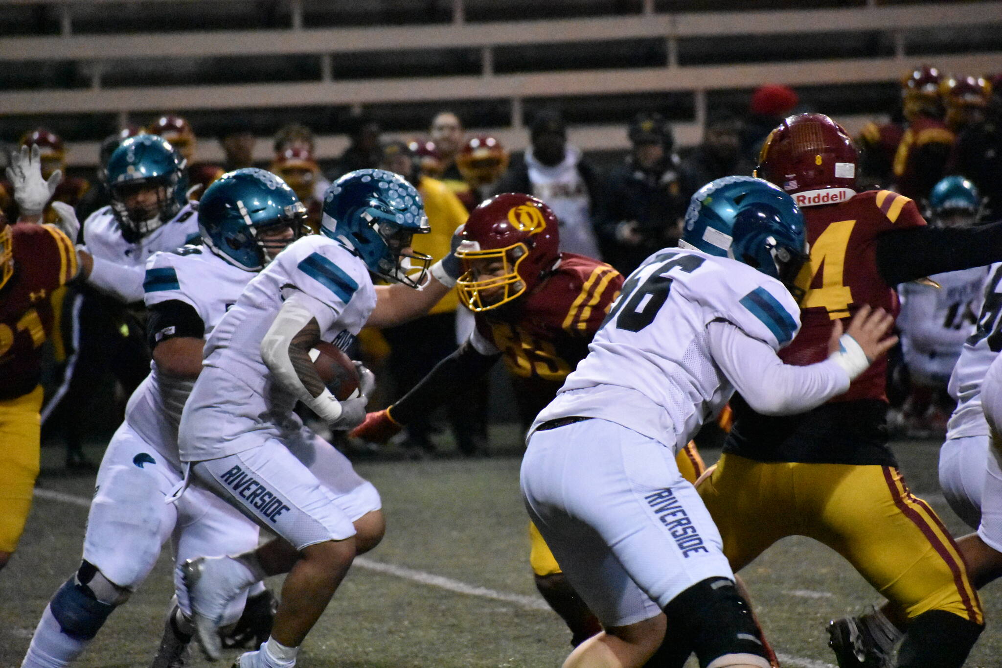 Thyrou Umi-Tuato’o runs into the teeth of the O’Dea defense. Ben Ray / The Reporter