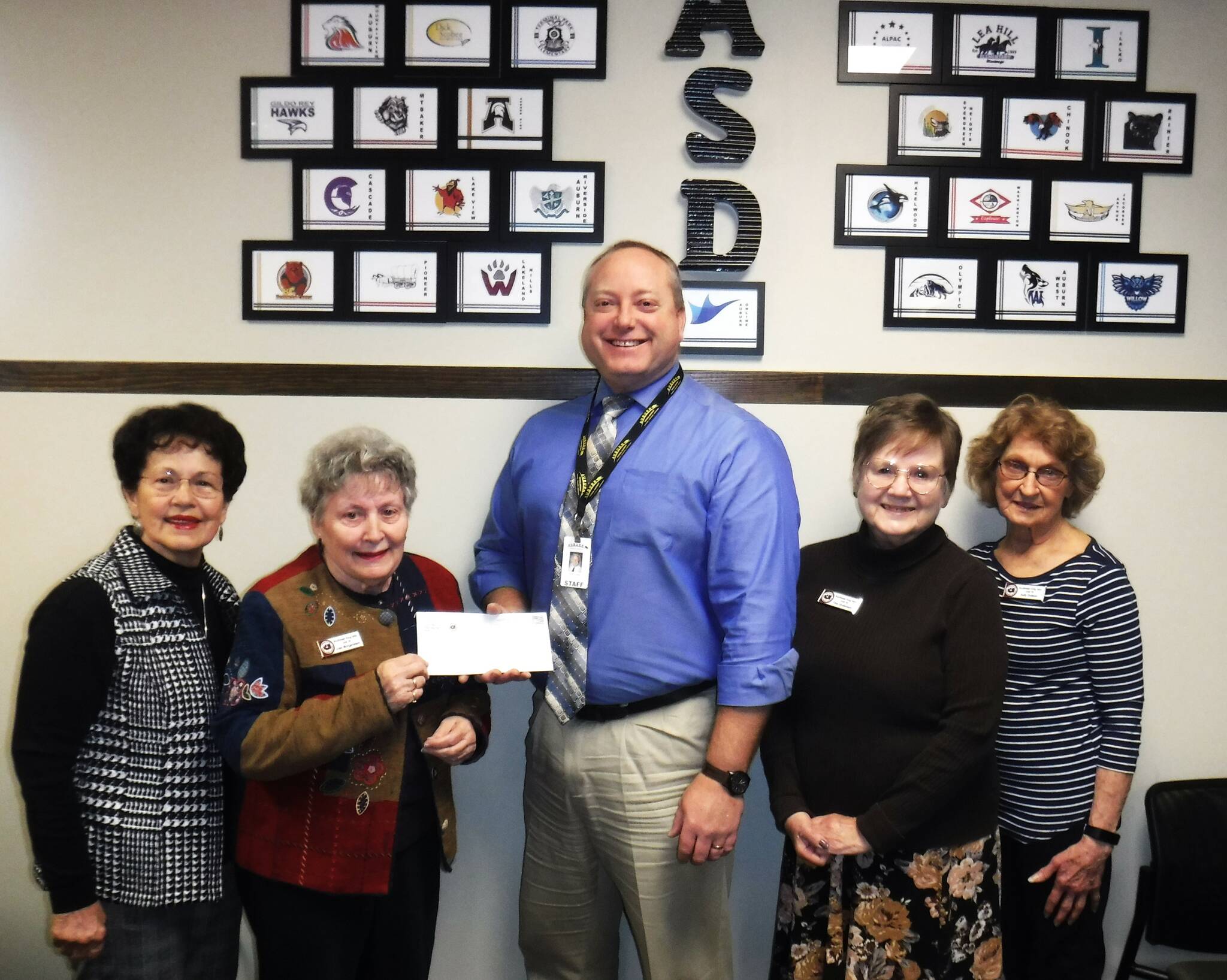 Pictured left to right: Sue Perez; Joan Morgenstern; Ryan Foster, Assistant Superintendent Auburn School District; Tina Underdahl; and Judy Dotson. (Courtesy photo)