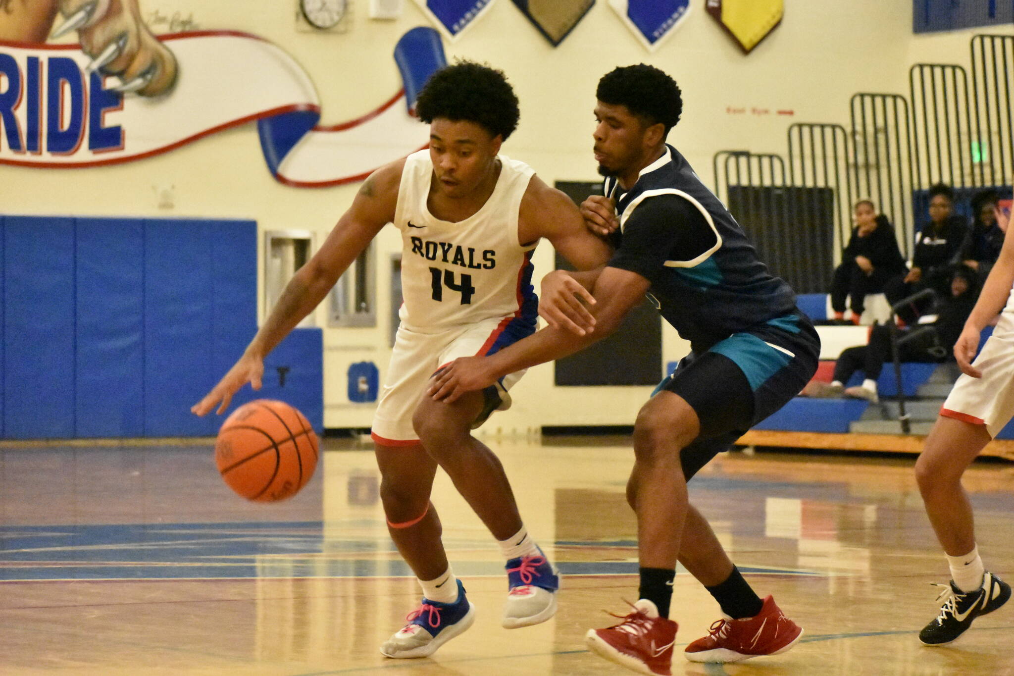 Photos by Ben Ray / The Reporter
Kent-Meridian outlasted Auburn Riverside on Dec. 11 with a 68-67 win at Kent-Meridian. Pictured: Freddie Boles takes on a Kent-Meridian player. Read more about the game at www.auburn-reporter.com.