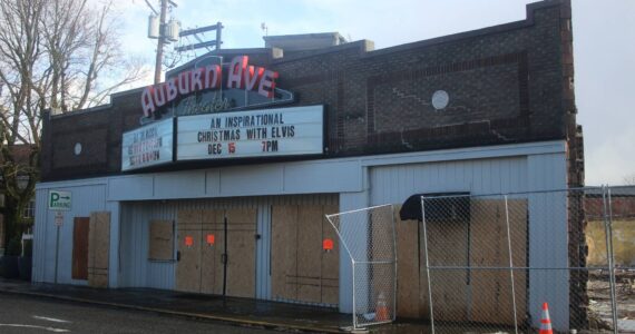 File photo
The Auburn Avenue Theater sits vacant and boarded up on Jan. 3, 2022, after being condemned due to safety concerns stemming from the demolition of the Max House Apartments complex next door.