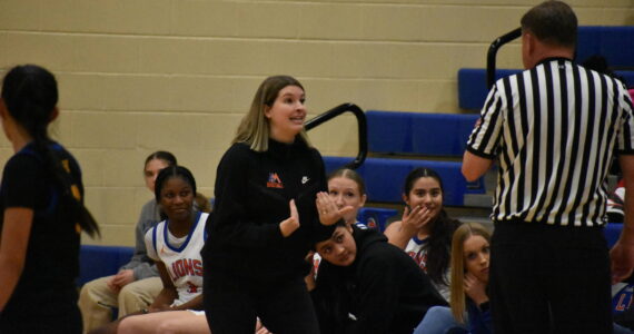 Auburn Mountainview Head Coach Alyse Lacey in an animated discussion with the referee. (Ben Ray / The Reporter)