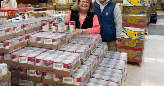 File photo
Debbie Christian and Leticia Brito of the Auburn Food Bank.