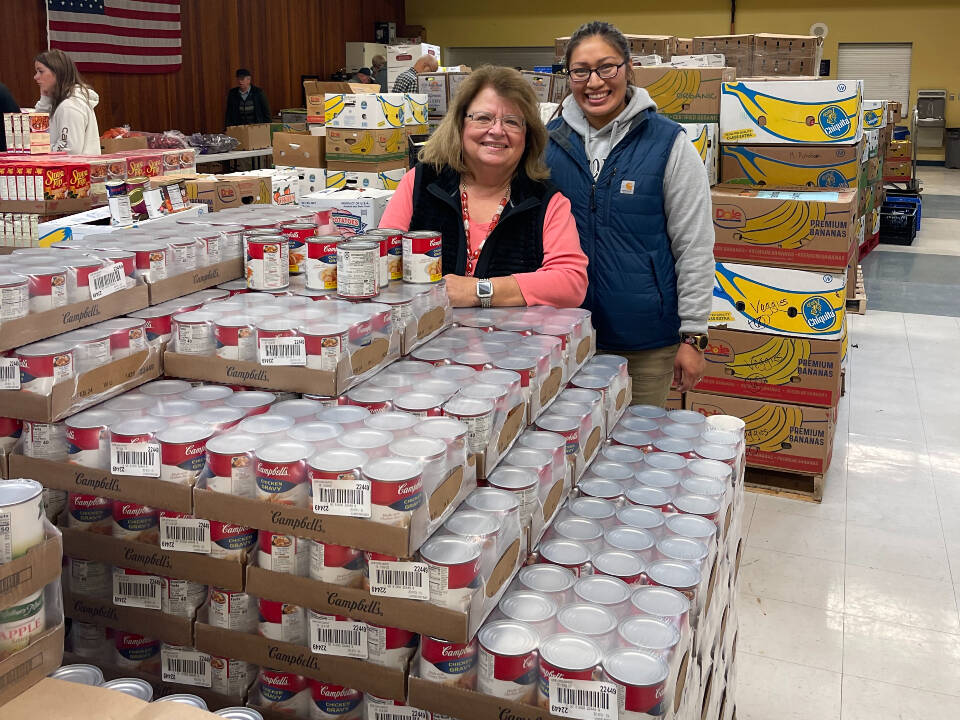 File photo
Debbie Christian and Leticia Brito of the Auburn Food Bank.