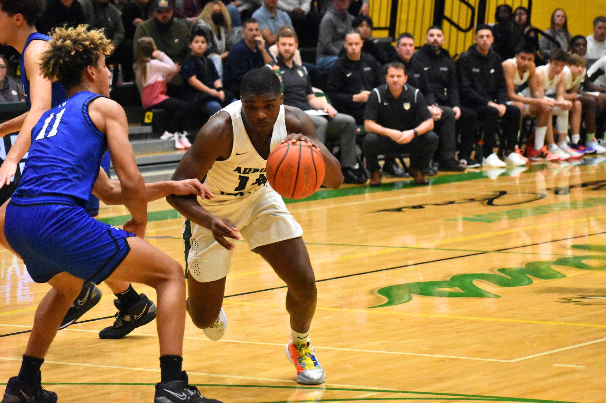 Luvens Valcin drives to the basket in 2022 against Federal Way.