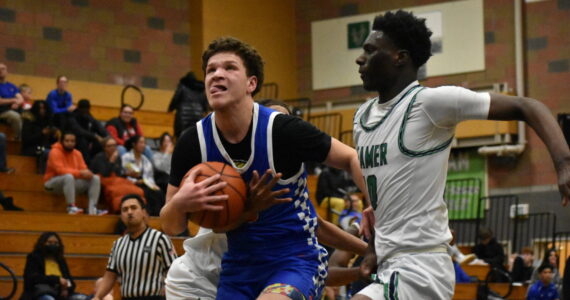 Lucas McClendon drives to the rack.