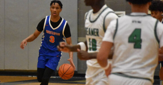 Photo by Ben Ray / Sound Publishing
Sebastian Arius of Auburn Mountainview dribbles through the Todd Beamer High School defense in a January game.