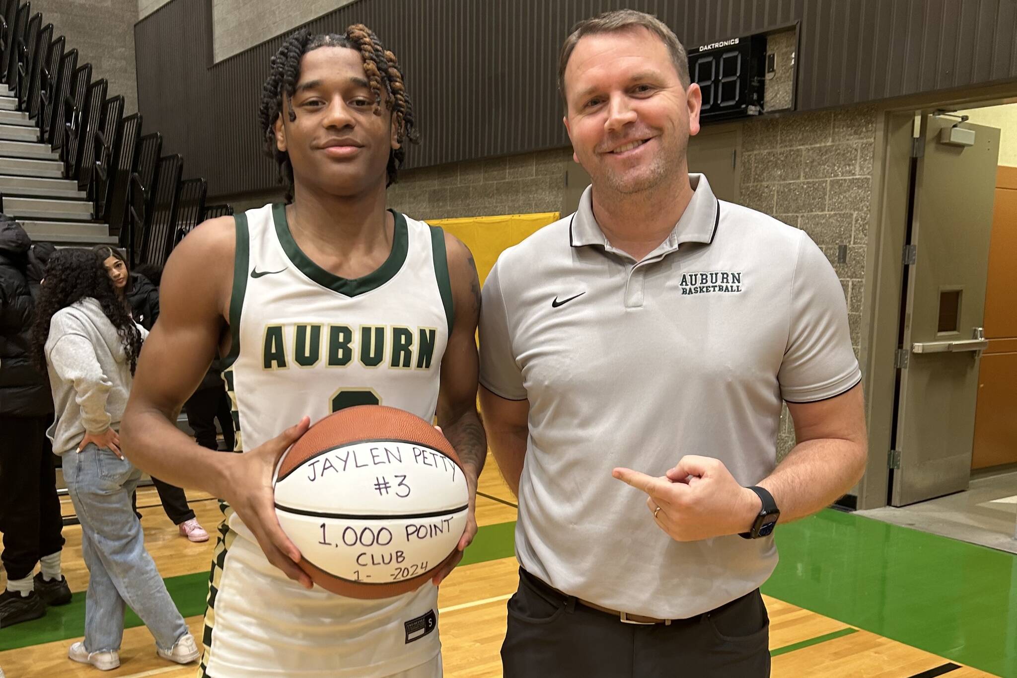 Auburn High School’s Jaylen Petty, left, with coach Ryan Hansen. Courtesy photo