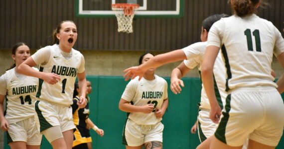 Avery Hansen leads the charge after a time out from Lincoln in the second half. Ben Ray / The Reporter